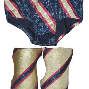 pro wrestling trunks and knee pads.