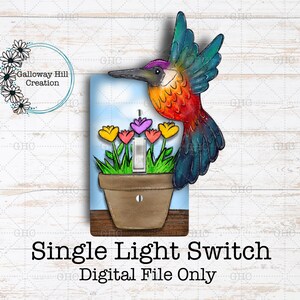May include: A decorative single light switch cover featuring a colorful hummingbird and a flower pot with yellow and purple flowers. The design includes the text "Single Light Switch Digital File Only".