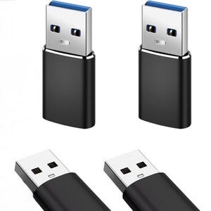 May include: Four USB-C to USB-A adapters. The adapters are black with a silver USB-A connector and a blue USB-C connector.