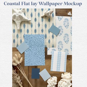 May include: A flat lay featuring wallpaper samples with blue and white patterns, including a leopard print and floral design. Decorative elements include a starfish, seashell, and paint swatches. The text "Coastal Flat lay Wallpaper Mockup" and "SB Graphik" are visible.
