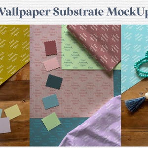 May include: A flat lay of different patterned wallpaper samples with color swatches. The samples are on a wooden surface. The text "Your Artwork Here" is repeated on each sample.