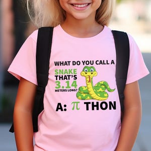 May include: A pink t-shirt with a green snake graphic and the text "What do you call a snake that's 3.14 meters long? A: π Thon".