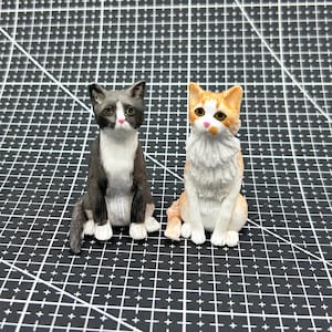 Personalized Pomeranian statues, cat statues, custom pet statues, pet birthday cake toppers, wedding cake toppers, cat wedding cake toppers
