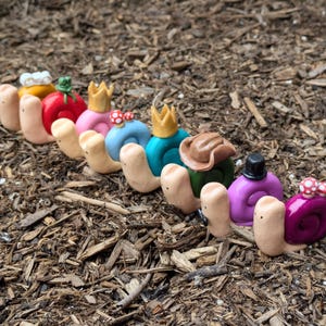 snails with hats polymer clay desk friend