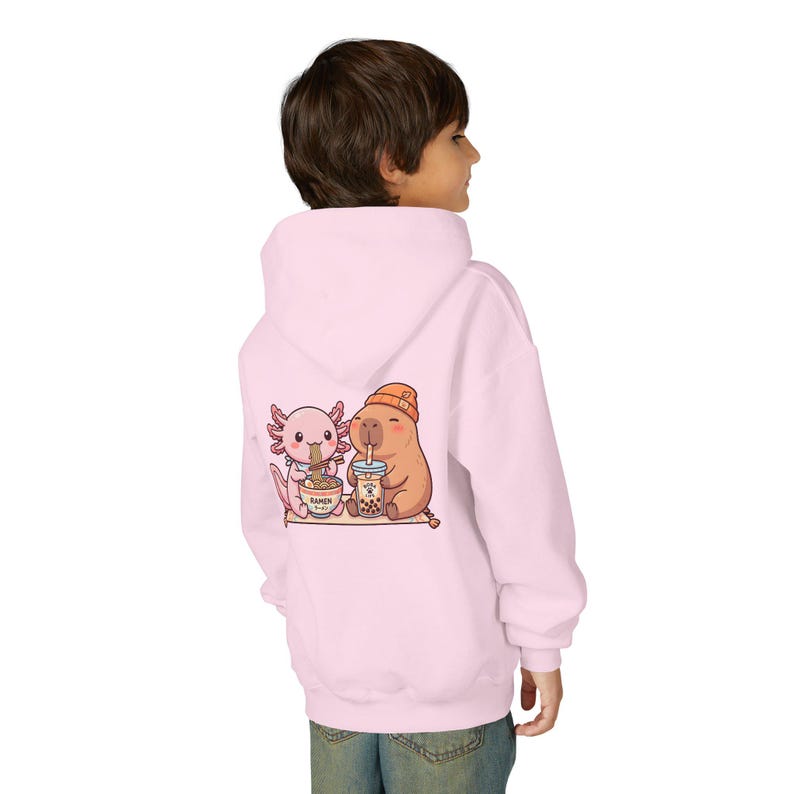 kid wearing pink Cozy kids hoodie kawaii animal friends boba ramen theme