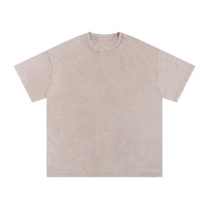 Flat-lay product view of a short-sleeve, neutral apricot acid wash oversized t-shirt against a plain white background.