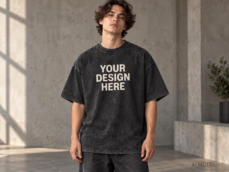 Model wearing a black custom acid wash oversized T-shirt with “Your Design Here” front print, heavyweight unisex streetwear tee.