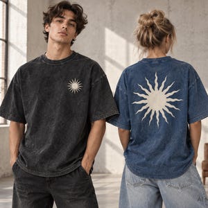 Models showing black and dark blue acid wash oversized T-shirts with custom left-chest and large back print placement options.
