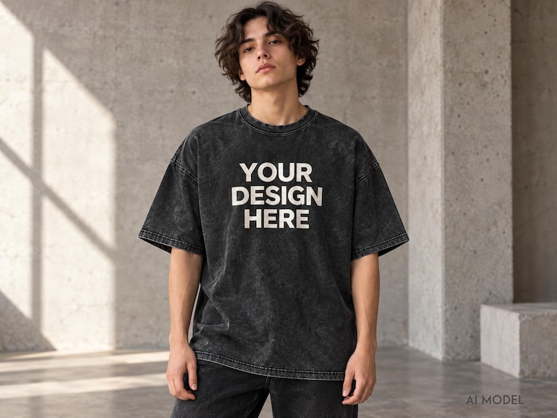 Model wearing a black custom acid wash oversized T-shirt with “Your Design Here” front print, heavyweight unisex streetwear tee.