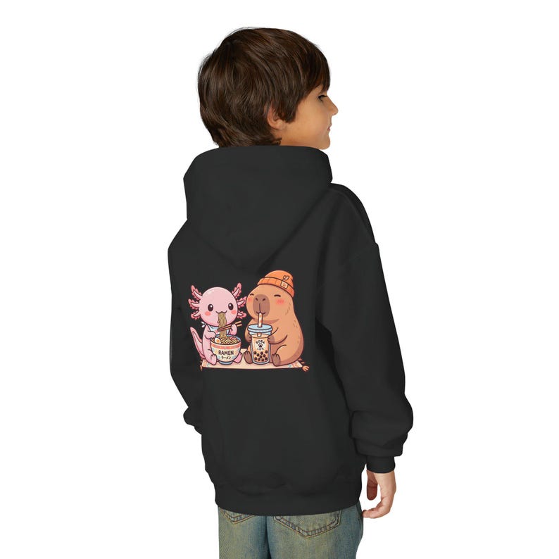 Kid wearing black Kawaii kids sweatshirt bubble tea ramen animal illustration