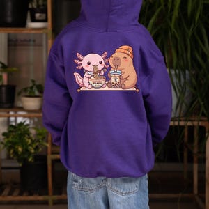 kid wearing purple Axolotl capybara kids hoodie kawaii ramen boba design