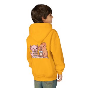 Kid wearing gold Kawaii kids sweatshirt bubble tea ramen animal illustration