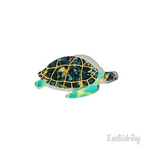 May include: A blue and green sea turtle figurine with a yellow and black shell. The turtle is swimming with its head turned to the side.