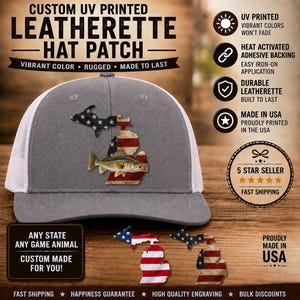 May include: A gray and white trucker hat featuring a custom UV printed leatherette patch shaped like the state of Michigan with an American flag pattern and a fish graphic. The patch is heat activated for iron-on application to apparel.