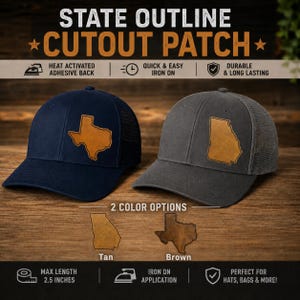 May include: Two baseball caps, one navy blue and one charcoal gray, each featuring a tan leather-like state outline cutout patch. The navy cap displays a Texas outline, while the gray cap displays a Georgia outline. Includes text: STATE OUTLINE CUTOUT PATCH.