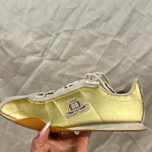 Bikkembergs Italian Metallic Gold Leather low top shoes Sneakers Bikkembergs Low-Top Sneakers In Gold - 77% Off | Editorialist main image 2