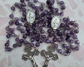 Rosario de amatista con medalla milagrosa