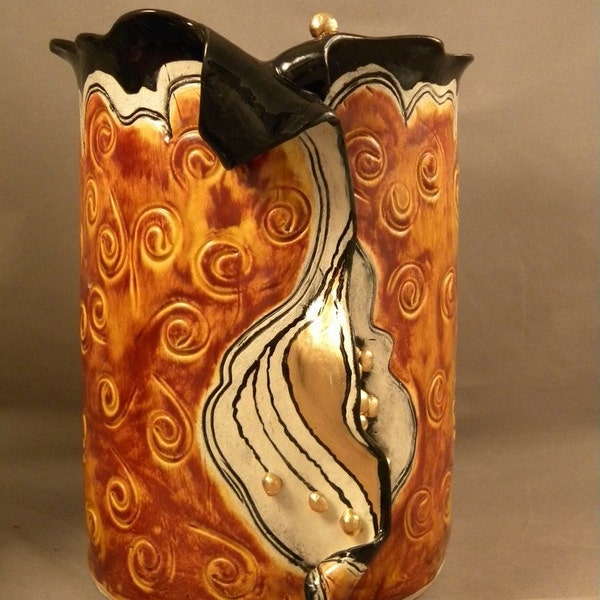 Wine chiller in gold and black with matching stopper by Joyce