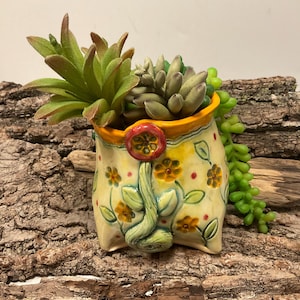 Maceta de cerámica con estampado floral naranja hecha a mano – Cuatro patas, maceta para suculentas