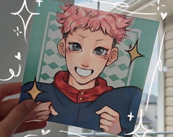 May include: Square art print featuring a smiling anime character with pink hair, a red hoodie, and a blue jacket. The background is a light green with a diamond pattern. Decorative sparkles and hearts surround the print.