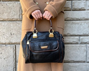 90s tow tone handbag , black pleather purse , brown pleather accent , top handle , capezio , gold hardware , vintage bags & purses