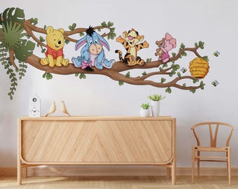 May include: A Winnie the Pooh themed wall decal featuring Tigger, Eeyore, Piglet, and Pooh Bear on a tree branch. The decal is perfect for a nursery or child's bedroom.
