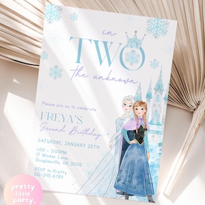 May include: A blue and white invitation card with a watercolor illustration of two princesses from the movie Frozen. The text on the card reads "in TWO the unknown" and "Please join us to celebrate FREYA'S Second Birthday... Saturday, January 25th 1:00-3:00PM 17 Winter Lane, Douglasville, GA 30135 RSVP to Pretty 012-345-6789".