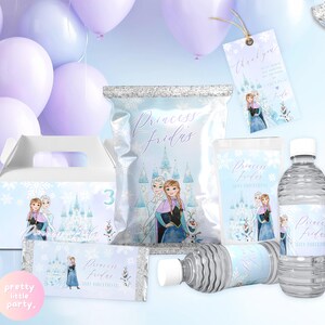 May include: Party supplies with a Frozen theme, including a gift box, candy bag, water bottles, and a chocolate bar. The items feature Elsa and Anna illustrations in a light blue, purple, and white colour scheme. The text "Princess Frida's" is visible.