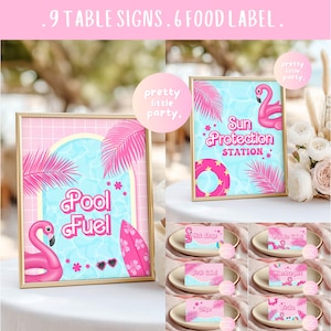 May include: Pink and gold framed party signs with a flamingo theme. The signs read "Pool Fuel" and "Sun Protection Station". Small food labels with flamingo graphics are also included. The signs and labels are decorated with pink palm fronds and stars.