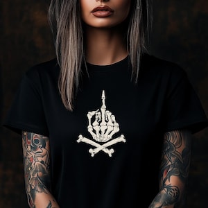 May include: Black t-shirt with a white skeleton hand giving the middle finger and crossed bones graphic.