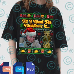 Könnte beinhalten: Schwarzes T-Shirt mit festlichem Design. Das Shirt zeigt den Text "All I Want For Christmas is..." mit einer Liste von Lebensmitteln. Ein Mann mit Weihnachtsmütze ist ebenfalls abgebildet.