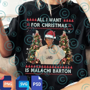 May include: Black t-shirt with the text "ALL I WANT FOR CHRISTMAS IS MALACHI BARTON". The shirt features a graphic of a person wearing a Santa hat and a white shirt, flanked by Christmas trees.