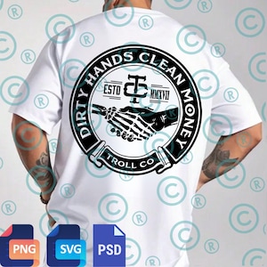 May include: White t-shirt featuring a black and white circular graphic with the text "DIRTY HANDS CLEAN MONEY" and "TROLL CO." The design includes a handshake with a skeleton hand. The shirt also has the text "ESTO MMXVII".