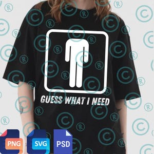 May include: Black t-shirt with a white graphic of a person inside a square, with the text "GUESS WHAT I NEED" below. The shirt has short sleeves and a relaxed fit. The design is centered on the front of the shirt.