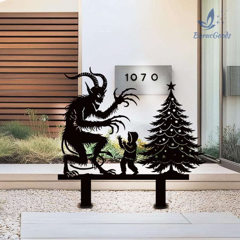 May include: Black metal yard art featuring a Krampus figure, a child, and a Christmas tree. The Krampus has horns and long claws. The child is reaching out. The Christmas tree has a star on top. The house number 1070 is visible.