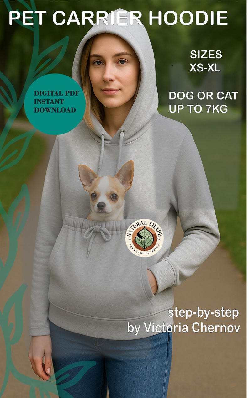 May include: A gray pet carrier hoodie with a kangaroo pocket holding a small dog. The hoodie has a drawstring and a hood. Text on the image reads "PET CARRIER HOODIE", "SIZES XS-XL", and "DOG OR CAT UP TO 7KG". The hoodie is designed by Victoria Chernov.
