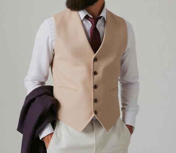 beige vest and tie