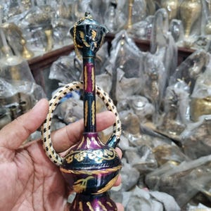 May include: A rustic wooden sign with the text "Welcome to our home" in white lettering. The sign features a distressed finish and a simple, inviting design, perfect for front door decor.