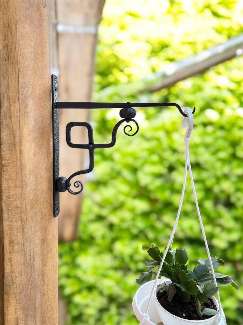 El soporte de metal para colgar macetas de pared está hecho a mano por un  herrero. - Etsy México, image size:960x1280