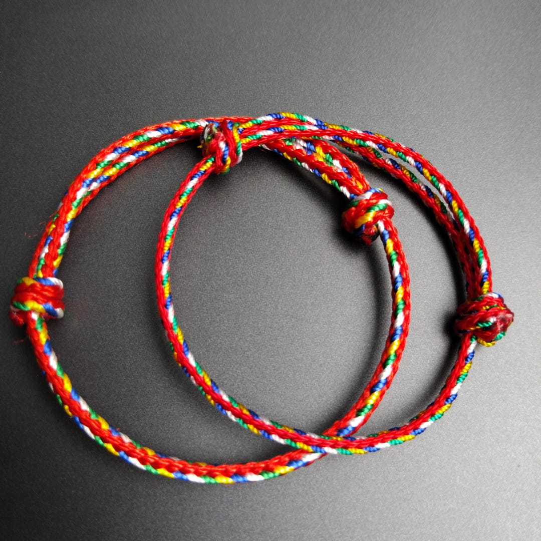 Braccialetto portafortuna tibetano rosso e bianco