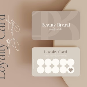 May include: Two beauty studio loyalty cards. One card features the text "Beauty Brand" and "beauty studio". The other card reads "Loyalty Card" and has spaces for stamps. The background is a neutral beige colour.