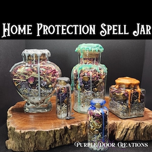 May include: A collection of glass spell jars filled with dried herbs and crystals, sealed with colorful wax. The jars are displayed on a wooden surface. Text on the image reads "HOME PROTECTION SPELL JAR" and "PURPLE DOOR CREATIONS".