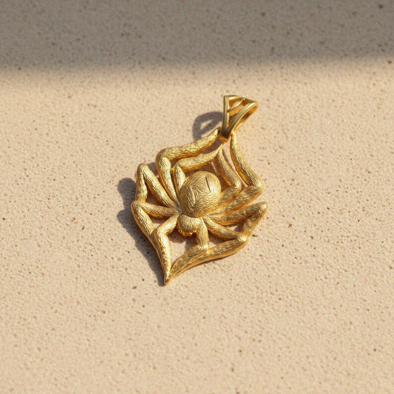 Spider pendant in 14k gold vermeil with textured body and legs creating web frame, handcrafted 925 sterling silver gothic arachnid jewelry
