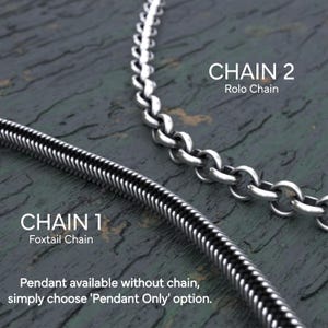 May include: Close-up of two silver chain styles: a foxtail chain and a rolo chain. The foxtail chain is black and silver, while the rolo chain has a classic circular link design. Text indicates pendants are available without a chain.