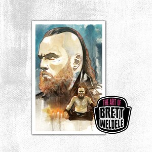 May include: Watercolor art print featuring a portrait of a man with a beard and shaved head, with a smaller image of the same man meditating. The print has a blue and white color scheme, with the text "THE ART OF BRETT WELDELE".
