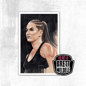 May include: A watercolor portrait of a person in a black tank top, with braided hair pulled back in a ponytail. The artwork is signed and features the text "THE ART OF BRETT WELDELE" in a shield-shaped logo.