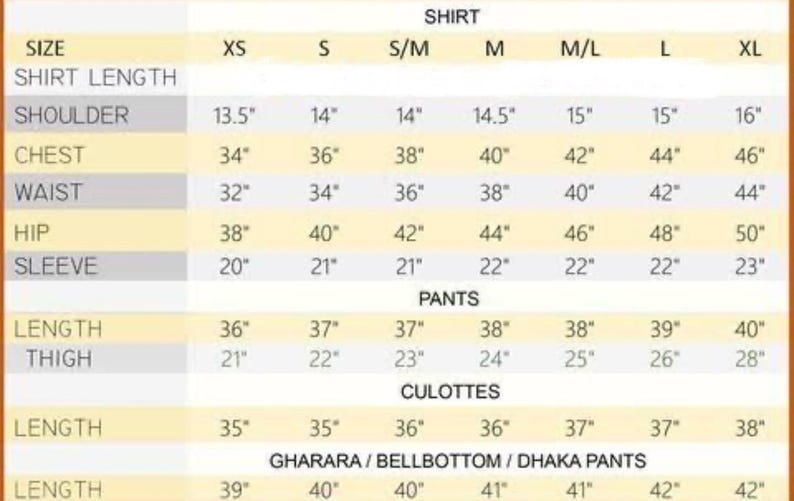 Puede incluir: Una tabla de tallas de ropa en pulgadas. Detalla las tallas de camisas, pantalones y culottes de la XS a la XL. Las medidas incluyen largo de camisa, hombro, pecho, cintura, cadera y manga. Tambi&eacute;n se incluyen las medidas de pantalones y culottes.