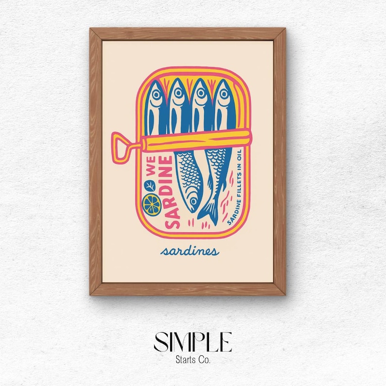 Ocean-themed sardine artwork as minimalist digital print for retro kitchen, perfect for a new home gift. May include: A framed illustration of a can of sardines. The can is yellow with a red and pink label that says 'We Sardine' and 'Sardine Fillets in Oil'. The can contains five blue sardines. The text 'sardines' is written in a blue font below the can.