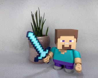 Minecraft Steve Figurine with Sword - Minecraft Gifts - Desk Toy - Steve 5.5" Tall - Fan Creation - Creative Inspiration to Craft Anything!