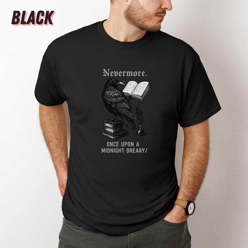 May include: Black t-shirt featuring a raven perched on books, with the text "Nevermore" and "Once Upon a Midnight Dreary/". The raven is illustrated with an open book and quill. The word "BLACK" is printed at the top left.